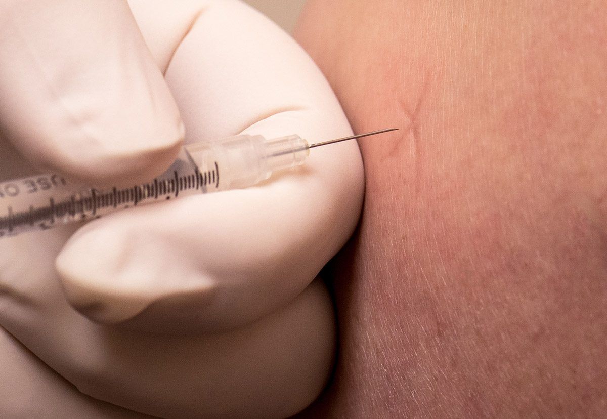 PRP injection into a patient's knee.