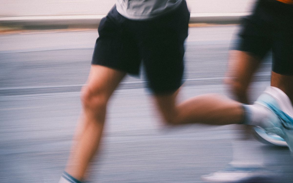 Close-up of a runner's legs in motion.